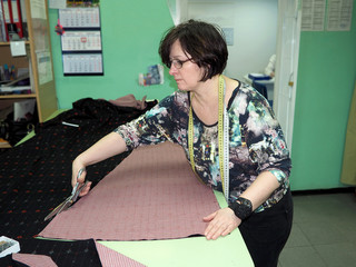 woman fashion designer works in the Atelier