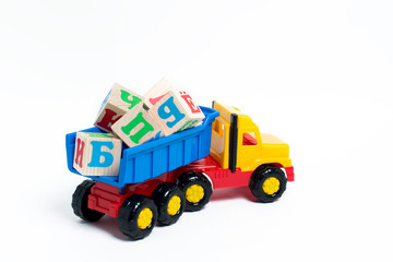 Toy truck and wooden cubes