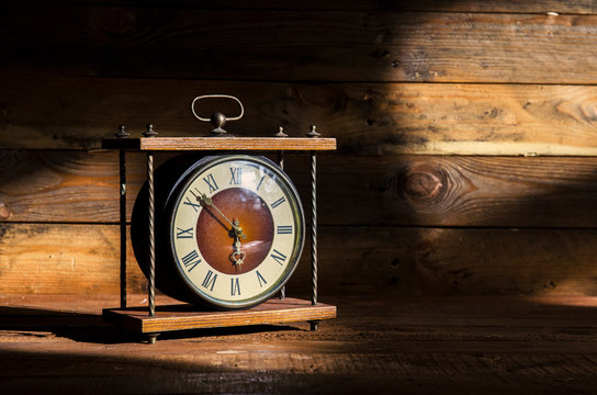 Vintage clock in the morning sun.