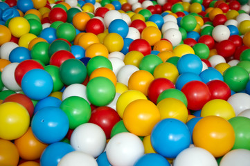 Fototapeta na wymiar Children multi colored balls for dry massage