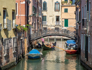 Italy beauty, boats on typical canal street in Venice , Venezia