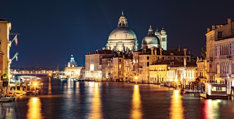 Fototapeta na wymiar Italy beauty, night cathedral Santa Maria della Salute on Grand canal in Venice, Venezia