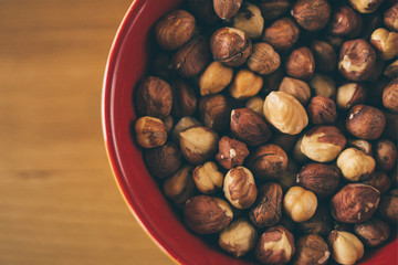 Hazelnuts in bowl, close up