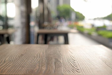 close-up table and cafe in the background