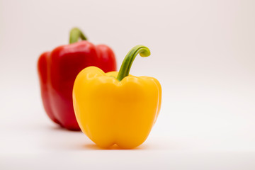 yellow and red pepper isolated on white background