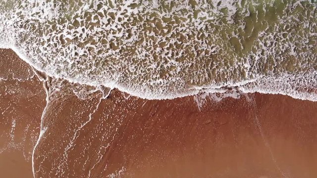 Aerail drone, Waves of sea with big foam, surfing spot, Italy Beach of Viareggio morning, Tuscany Versilia.