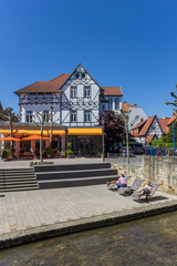 People on sunbeds at the canal in Bad Salzuflen, Germany