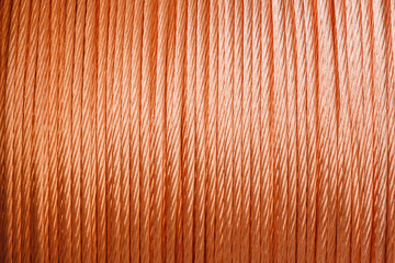 Closeup background texture of copper wire, industrial production concept