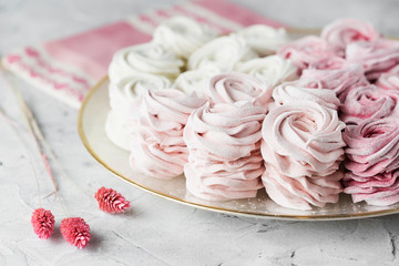 dessert zephyr marshmallows close up. Big zephyr sprinkled with powdered sugar. Valentine's Day concept. Food photography