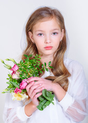 portrait of little model girl in studio