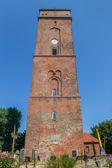 Fototapeta na wymiar Historic lighthouse in the center of Borkum village, Germany