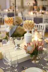 protea flower arrangement decor at gala dinner table setting