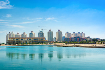 Fototapeta na wymiar Beachside residences in The Pearl Qatar