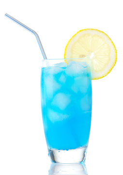 Blue lagoon cocktail with slice of lemon with straw isolated on white