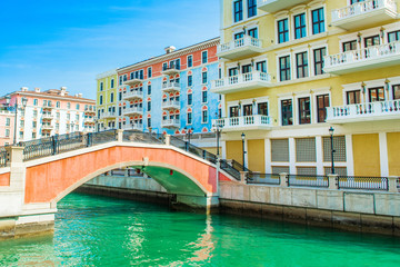 Fototapeta na wymiar Colorful buildings in venetian style of the Qanat Quartier