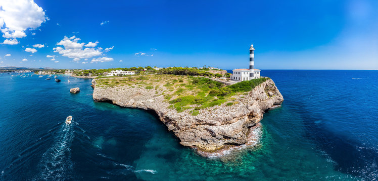 Spain, Baleares, Mallorca, Portocolom, Punta de ses Crestes, Bay of Portocolom and Cala Parbacana, Lighthouse