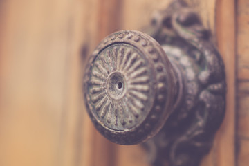 old round metal door handle close up