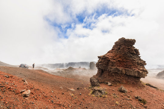 Reunion, Reunion National Park, Piton de la Fournaise, Route du volcan, Tourist in the Plaine des Sables