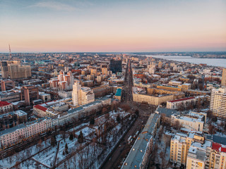 Obraz premium Aerial shot of winter Voronezh midtown at sunset evening time, old city architecture buildings, roads and car traffic