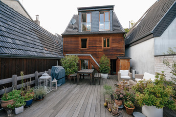 Back side of one-family house with terrace