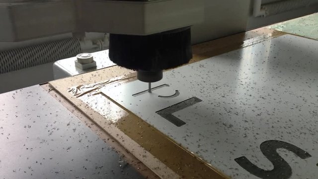 Milling aluminum in three axis CNC machine. 