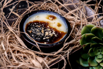 Oven baked rice pudding on black backround