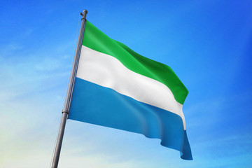 Sierra Leone flag waving on the blue sky 3D illustration