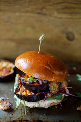 Vegan burger with white bean puree and spicy aubergine slices