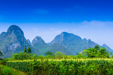 Fototapeta premium Mountain and fields scenery