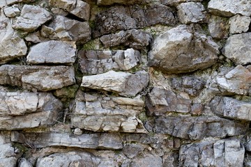 Old stone wall, wall made of limestone, 