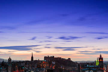 Fototapeta na wymiar Picturesque view over evening Edinburgh old town with the Castle from Calton hill, Scotland