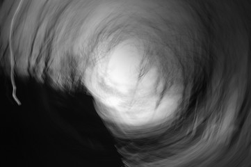 abstract swirling sunset in black and white