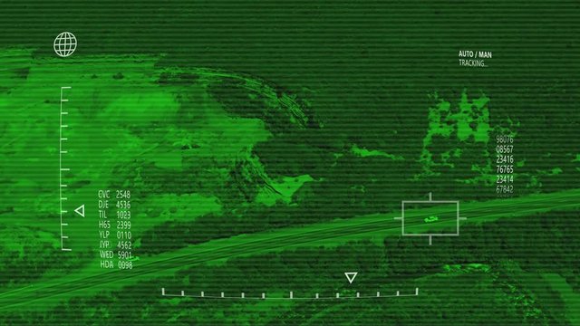 Night vision aerial tracking of car traveling on country road, surveillance concept