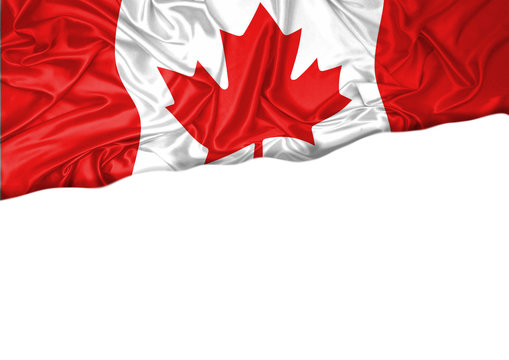 National flag of Canada hoisted outdoors with white background. Canada Day Celebration