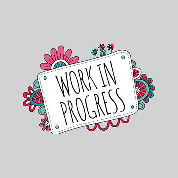 Work In Progress Sign With Flowers Doodle Vector On A Grey Background