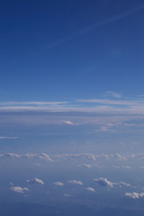 Fototapeta premium Beautiful Above clouds from an airplane
