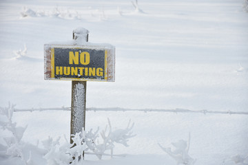 Frost Covered No Trespassing Sign