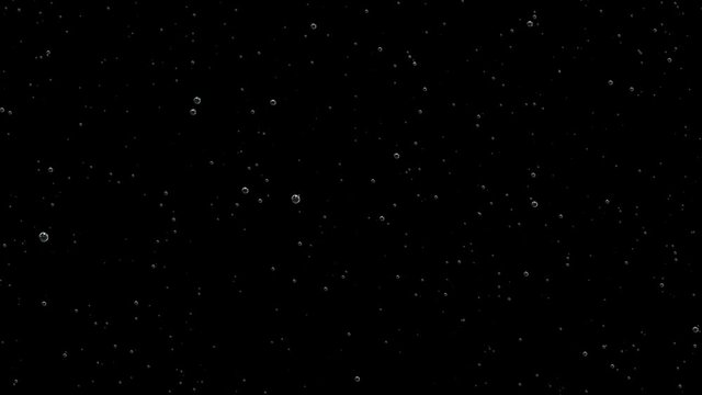 A moving camera shoots upward bubbles.