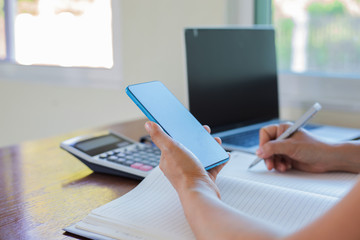 Fototapeta premium Business woman hand working with notepad on workplace in office, Search Engine Optimization, lifestyle woman and technology communication