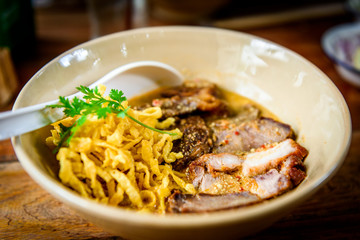 Khao soy. Traditional northern Thai food. Thai curry with noodle with meat.