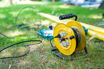 electric cable hub in the field grass garden at noon