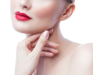 Obraz na płótnie Canvas Lips, red lipstick, part of face of fashion model woman beauty portrait. Hand near neck. Clean skin