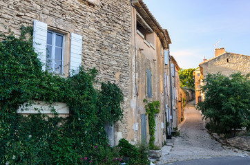 Fototapeta na wymiar The street in the town of Gord, small charming house in Provence, France