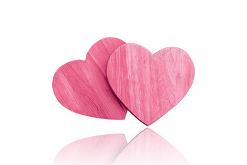 couple wooden pink heart isolated on white background with clipping path.