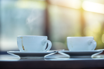 two coffee mug on the table in the morning cafe. meeting and talking together concept.