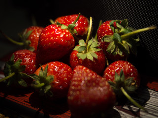 strawberries on black background