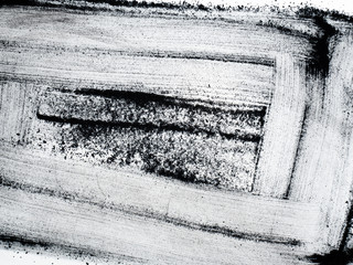 Abstract picture of activated charcoals powder on white background.