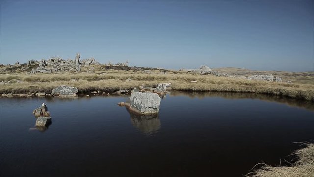 Bomb Crater Left by Shell Explosion near Port Stanley, Falkland Islands (Malvinas)