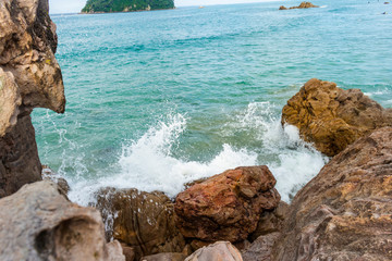 waves crashing on rocks