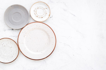 Mockup with plates. Empty ceramic plates on white background top view space for text